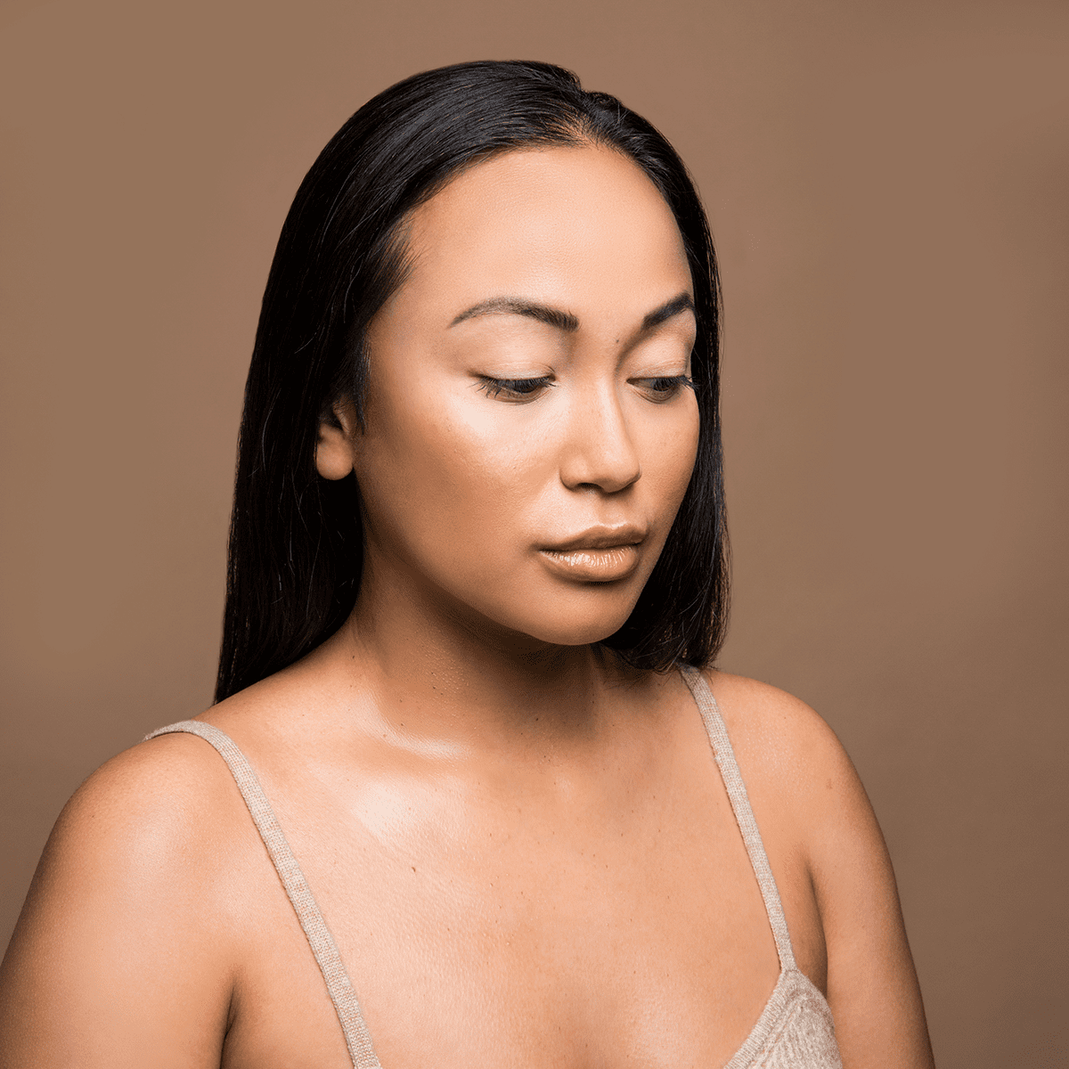 woman's smooth radiant skin after receiving sculptra and microneedling